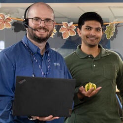 Team standing in front of reception desk