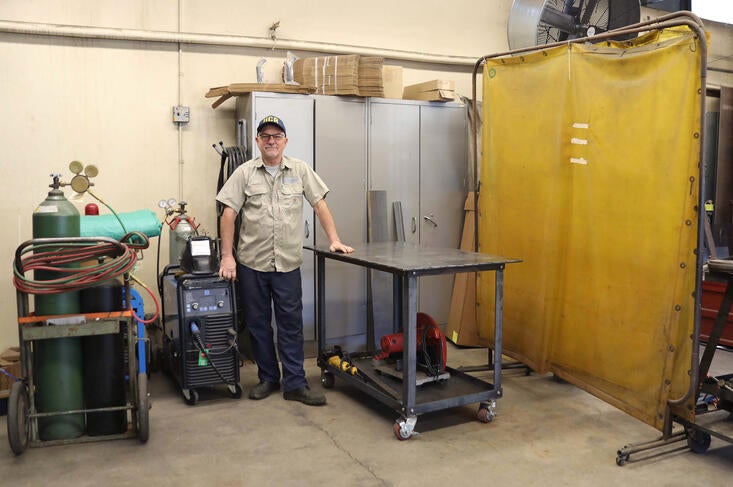 Facilities worker in a repair shop